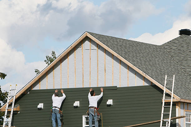 Professional Siding technician working in Austin, IN